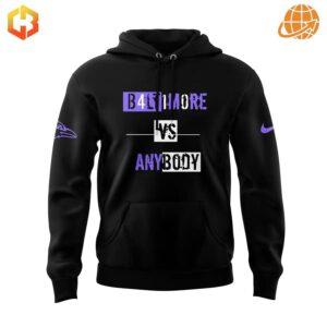 Front of Baltimore Ravens vs Anybody Hoodie with purple and white text design on black fabric.