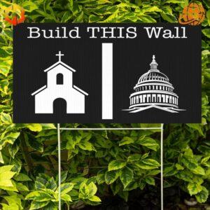 A yard sign with an image of a wall and the text 'Build This Wall: Separation of Church and State.