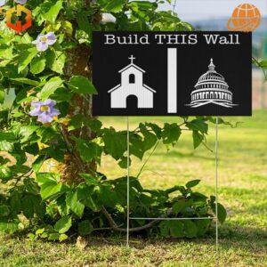 A yard sign that reads 'Build This Wall: Separation of Church and State.