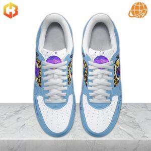 Chris Martin wearing the collaborative Coldplay Nike Air Force 1 shoes.