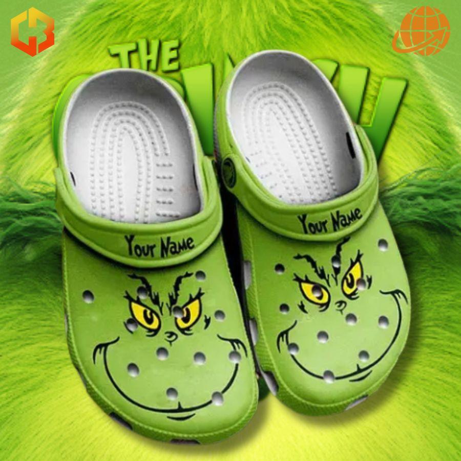 Custom Grinch Crocs Shoes with personalized name straps, displaying the Grinch's face on bright green clogs.