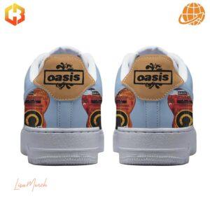 Back view of Oasis-themed Nike Air Force 1 sneakers showcasing heel design and branding.