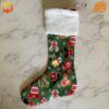 Complete Disney Mickey Mouse Cookies Christmas Stocking with green patterned body and white fluffy cuff.