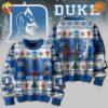 Duke Blue Devils sweater with festive holiday design featuring snowflakes and gingerbread men.