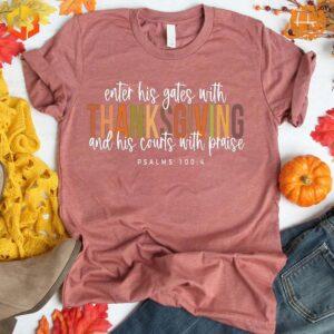 The shirt is pink and features the phrase 'Enter His Gates with Thanksgiving'