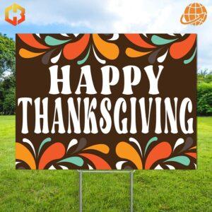 A yard sign with a turkey graphic and the words 'Happy Thanksgiving'.