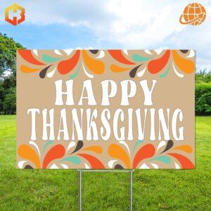 A yard sign that says 'Happy Thanksgiving