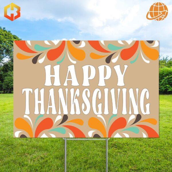 A yard sign that says 'Happy Thanksgiving