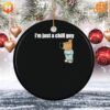 A Christmas ornament with a laid-back figure and the phrase 'I'm Just A Chill Guy' written on it.