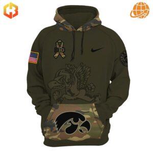 Black Iowa Hawkeyes hoodie with camouflage pattern and Salute to Service logo.