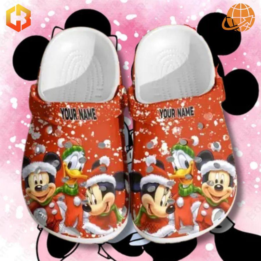 Festive Mickey Minnie Mouse Custom Crocs Shoes with snowfall design, Mickey and Minnie in holiday outfits, and customizable name feature.