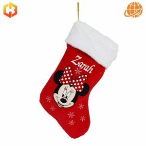 Personalized Minnie Mouse Christmas stocking in red with white trim, featuring Minnie's face and snowflake decorations.