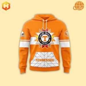 Front view of Native American Heritage Month Tennessee Volunteers Hoodie, displaying sunburst logo, white sleeve stripes, and geometric pattern on vibrant orange background.