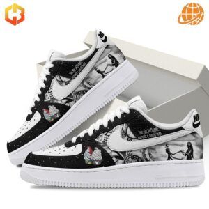 Angled side view of The Night Before Christmas Nike Air Force 1 Shoes with black leather upper, white speckles, and detailed illustrations of movie characters.