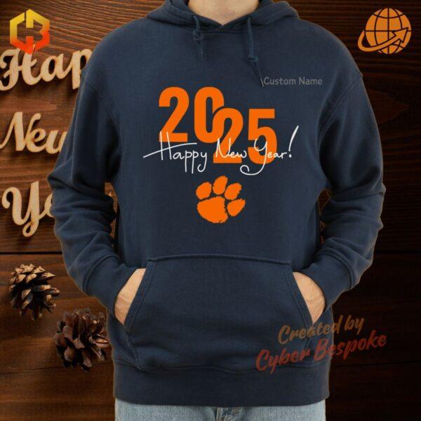 Clemson Tigers Happy New Year 2025 hoodie in orange with the iconic tiger paw logo and festive New Year graphics