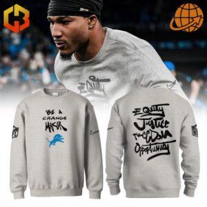 Detroit Lions Equity Justice Freedom Opportunity Sweatshirt worn by athlete, with front and back design details.