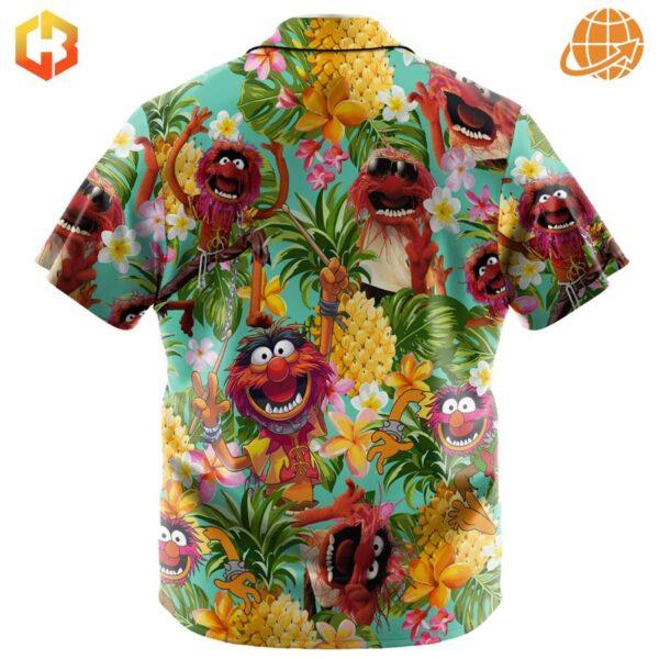 Elmo, Cookie Monster, and friends frolic in a tropical paradise on this playful Hawaiian shirt.