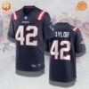 Navy blue J.J. Taylor New England Patriots football jersey with player number 42 on the front and back