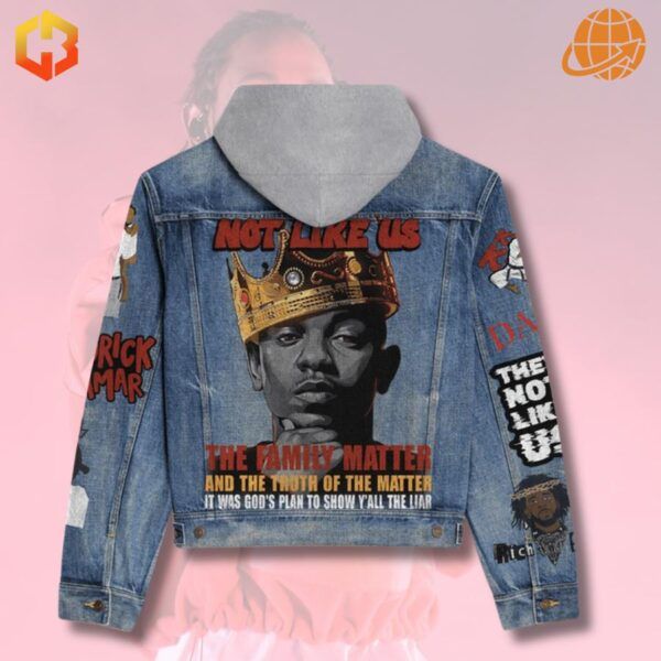 Back of Kendrick Lamar themed denim jacket with crown portrait and "Not Like Us" text.