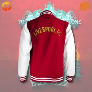 Close-up of a Liverpool FC baseball jacket, showcasing the team crest and colors.