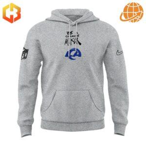 Front view of gray Los Angeles Rams NFL Inspire Change hoodie with "Be A Change Maker" text.