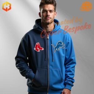 A man wearing a blue zip-up hoodie featuring a mix of MLB and NFL team logos, including the Boston Red Sox and Detroit Lions. The hoodie has a sleek, modern design with bold graphics, a front pocket, and an adjustable hood.