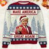 A cozy Christmas sweater featuring the slogan 'Make America Great Again Trump 2024' in bold red, white, and blue patriotic colors, perfect for the holiday season