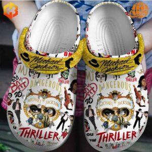 Close-up of Michael Jackson Thriller Crocs Shoes displaying detailed "Thriller" album artwork and gold glitter straps.