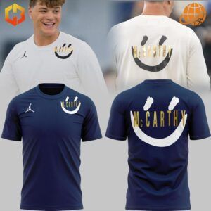 Michigan Wolverines McCarthy shirts in white and navy with smiley face designs.