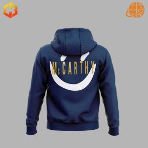 Back view of navy Michigan Wolverines McCarthy hoodie with large smiley face design.