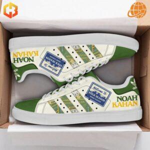 Side view of Noah Kahan Stick Season Stan Smith Shoes in box