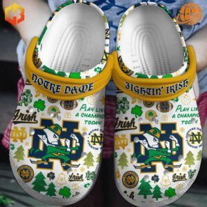 Close-up view of the Notre Dame Fighting Irish Crocs Shoes with vibrant blue, gold, and green design featuring the leprechaun mascot and shamrocks.