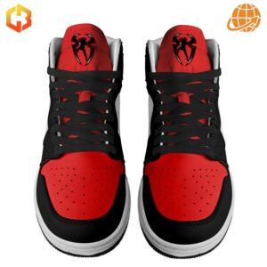 Front view of Roman Reigns OTC Air Jordan 1 Shoes showing red toe box, black laces, and spider logo on tongue.