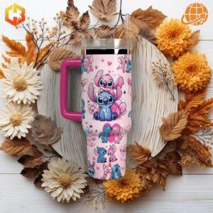 Stitch And Angel Stanley Tumbler surrounded by autumn leaves and flowers.