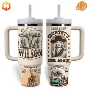 Both sides of Lainey Wilson themed Stanley tumbler with country music artwork