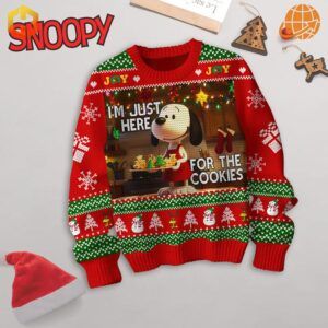 Detailed view of Snoopy Christmas sweater with cookie-themed design and traditional holiday patterns.