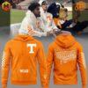 Tennessee Volunteers Neyland Stadium Hoodie in orange and white, worn by fans at a football game.