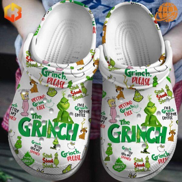 The Grinch Please Crocs Shoes in white with colorful Grinch illustrations and quotes