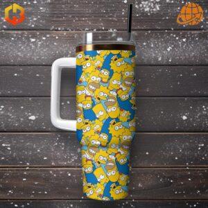 Simpsons Stanley Tumbler on snowy wooden surface