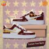 Washington Commanders Nike Air Force 1 sneakers with burgundy and gold accents.