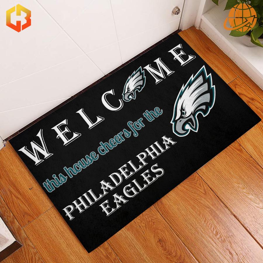 Step into Eagles fandom with the Welcome This House Cheers for the Philadelphia Eagles Doormat and matching cleats for the complete look.