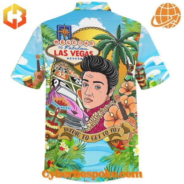 Colorful Hawaiian shirt featuring Elvis Presley, Las Vegas imagery, and tropical elements on a blue background.