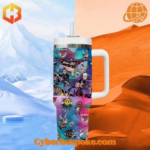 Blink-182 tumbler in front of mountain and desert landscape