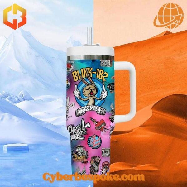 Detailed view of Blink-182 tumbler artwork with alien mascot