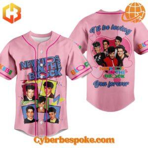 Front view of the 'I'll Be Loving You Forever' New Kids on the Block Baseball Jersey in pink with colorful graphics.