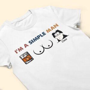 Graphic shirt with text 'I'm a Simple Man' featuring beer, boobies, and cat illustrations.