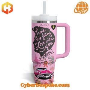 Pink tumbler with Elvis Presley quote and classic car illustration.