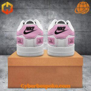 The unisex Machine Gun Kelly's Life In Pink Nike Air Force Shoes is designed to keep you moving in style