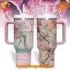 Front view of the Melanie Martinez Light Shower Stanley Tumbler Cup featuring pastel pink and purple collage design with floral patterns and butterflies.