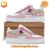 Melanie Martinez Pink Nike Air Force 1 Shoes showcasing pastel pink and white leather with mint green swoosh and embroidered bird and heart design.